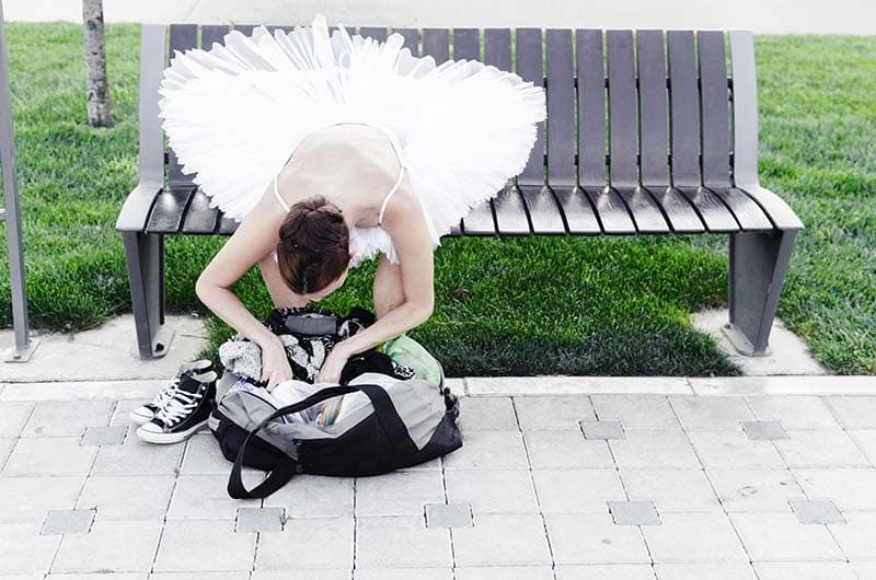 Girl Checking Things in Bag